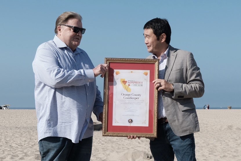 Senator Min presents Nonprofit of the Year Award to OC Coastkeeper CEO Garry Brown